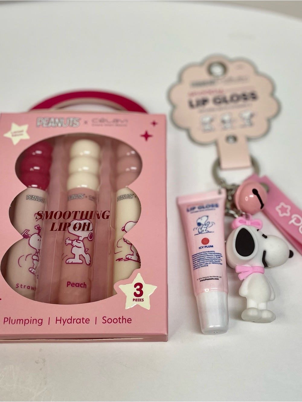Peanuts Celavi  Pink Smoothing Lip Oil Trio with Snoopy Pink Gloss Charm
